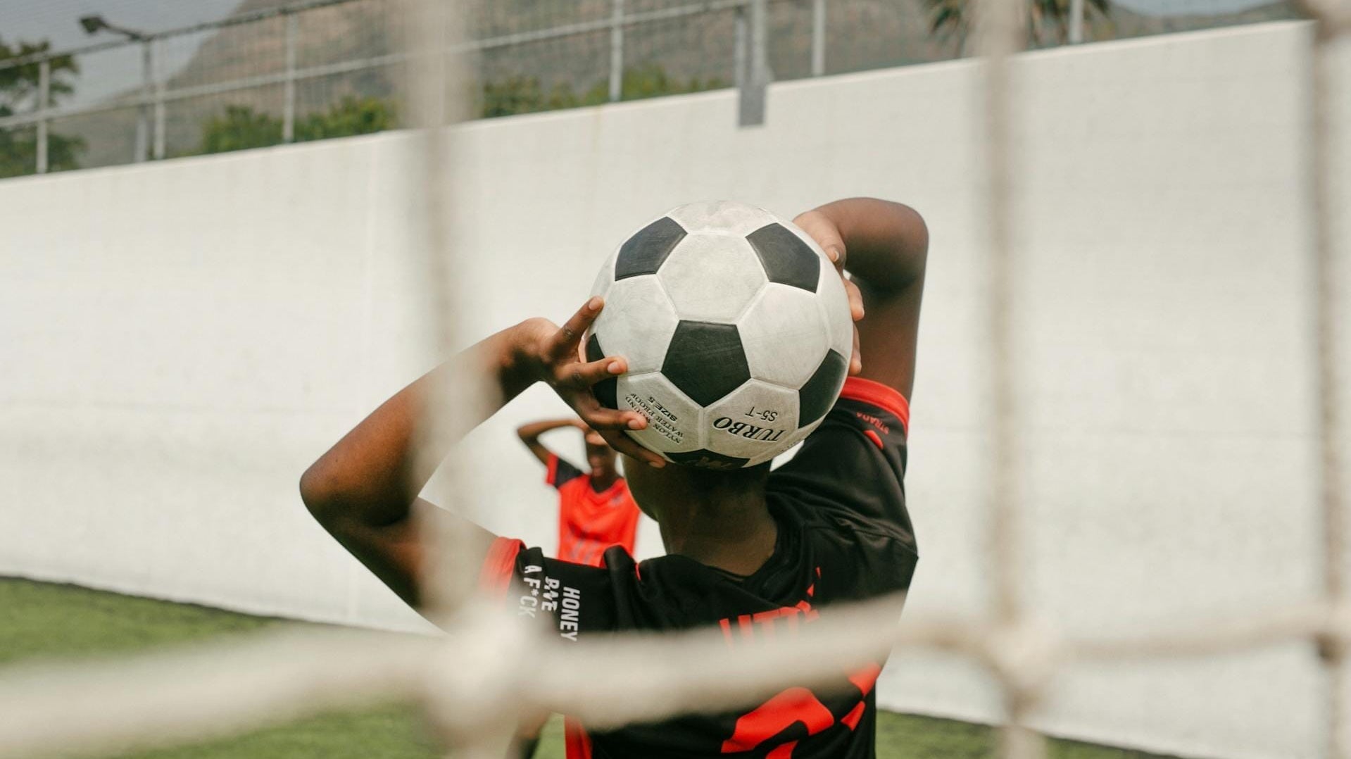 5 Practical Ways to Keep Soccer Balls in Your Backyard (And Keep the Neighbors Happy) | Photo by RF._.studio