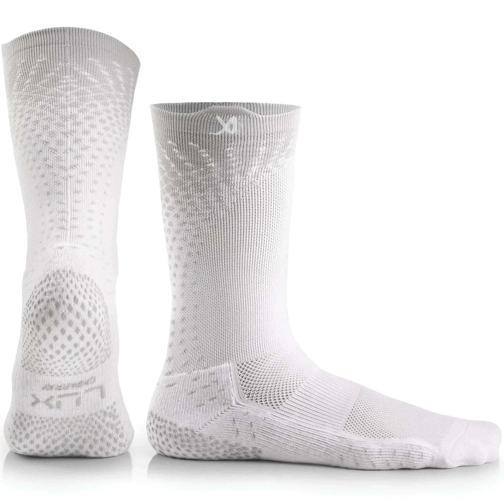 White LUX Grip Cleat Socks with advanced grip technology and calf-length design for soccer players