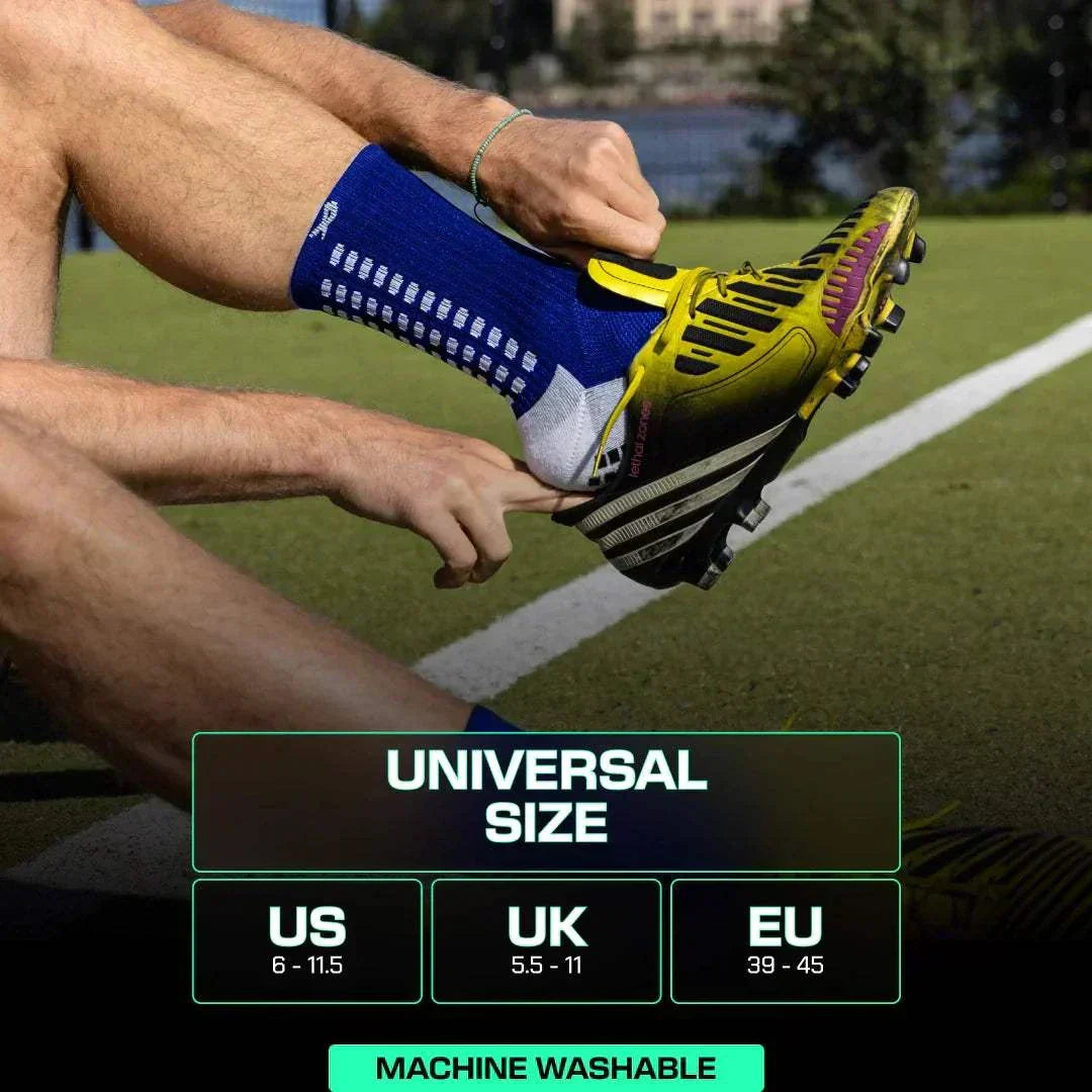Blue LUX grip soccer socks with inner and outer anti-slip technology on athlete's calf