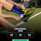 Blue LUX grip soccer socks with inner and outer anti-slip technology on athlete's calf