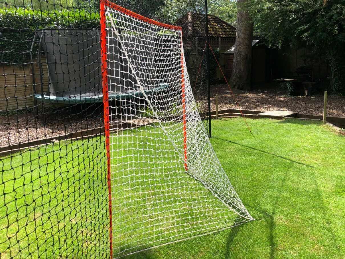 Open Goaaal® Lacrosse Goal 2-in-1 Trainer: practice nonstop with built-in backstop action.