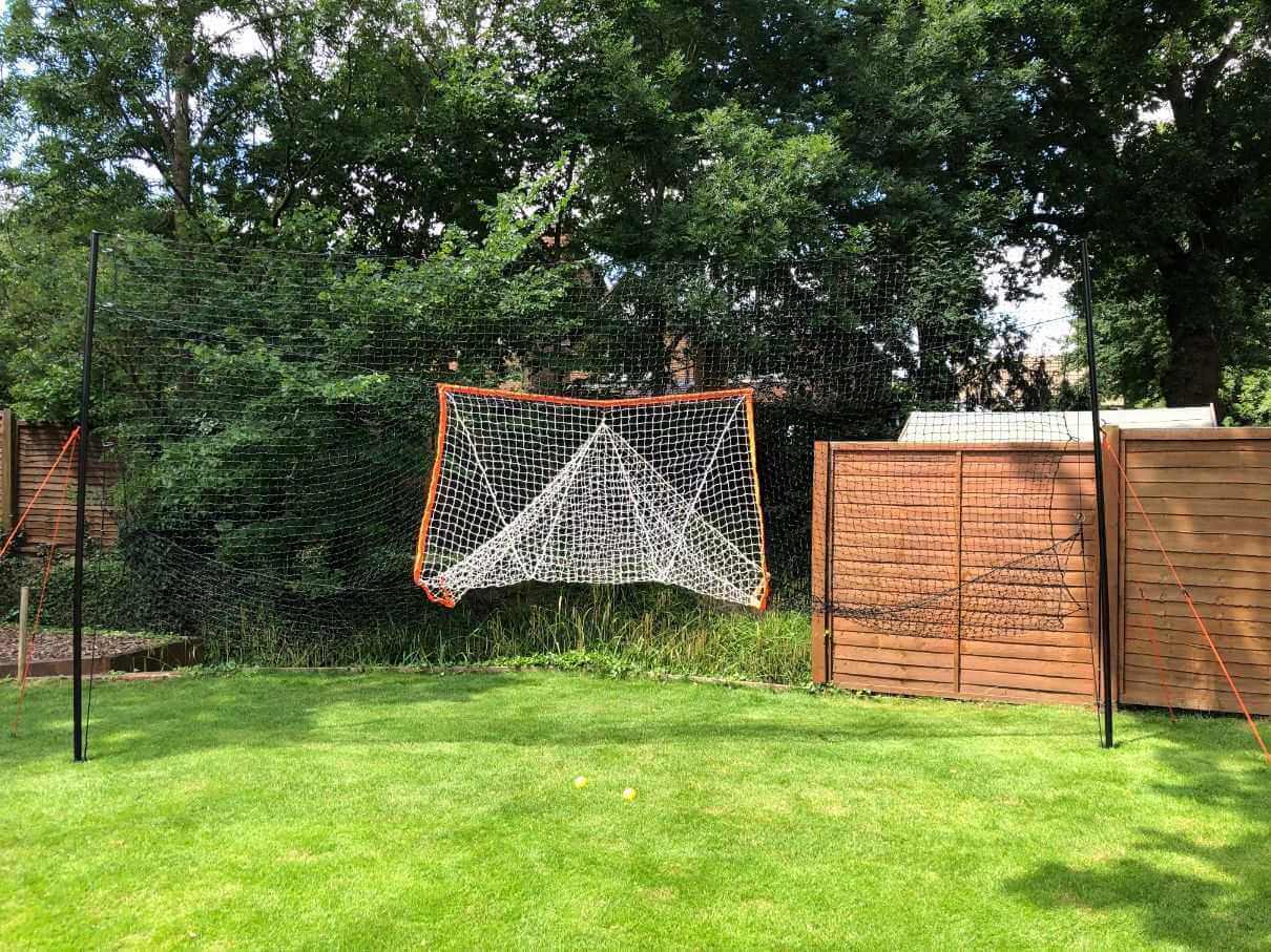 Backyard lacrosse is better with Open Goaaal® Lacrosse Goal 2-in-1 Trainer. Score more, chase less!