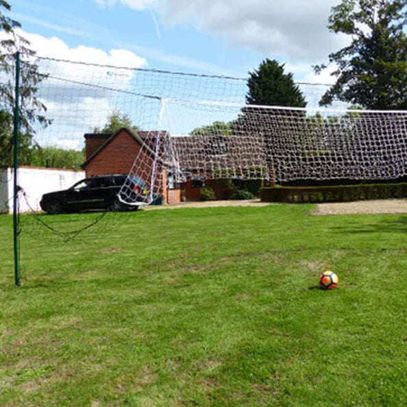 Open Goaaal net raised up for mowing