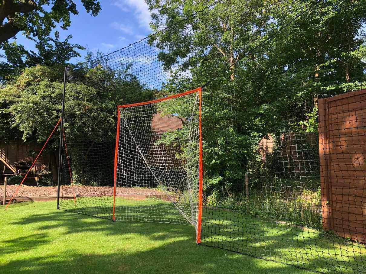 Train smarter with Open Goaaal® Lacrosse Goal 2-in-1 Trainer - goal + backstop built in.